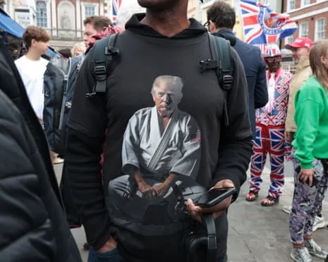 Devoted Followers Gather in the Historic Town to Animate the President’s Spectacle of Minimal Action